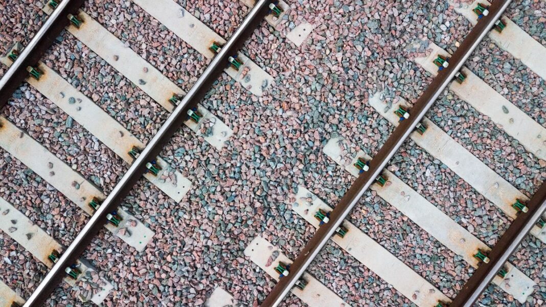 The Rail Infrastructure Development Company (Karnataka) Limited (K-Ride), Bengaluru suburban rail project (BSRP), Kempegowda International Airport (KIA), Doddajala, Ballari Road, industrial hubs, residential areas, alternative road connection, Majestic-Devanahalli corridor, Begur Road, BK Halli Road junction, Karnataka Industrial Areas Development Board, Defence and Aerospace Park, environmental sustainability, renewable energy, carbon emissions reduction, sustainable practices, public transportation integration, feeder bus services, connectivity, accessibility