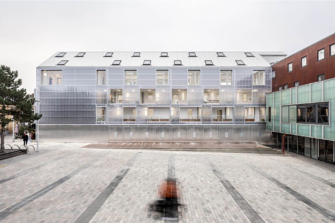 Bradbury Works, Gillett Square, Dalston, refurbished, affordable workspace, flexible spaces, Victorian terrace, collaborative environment, refurbished entrance,polycarbonate facade, reflective,