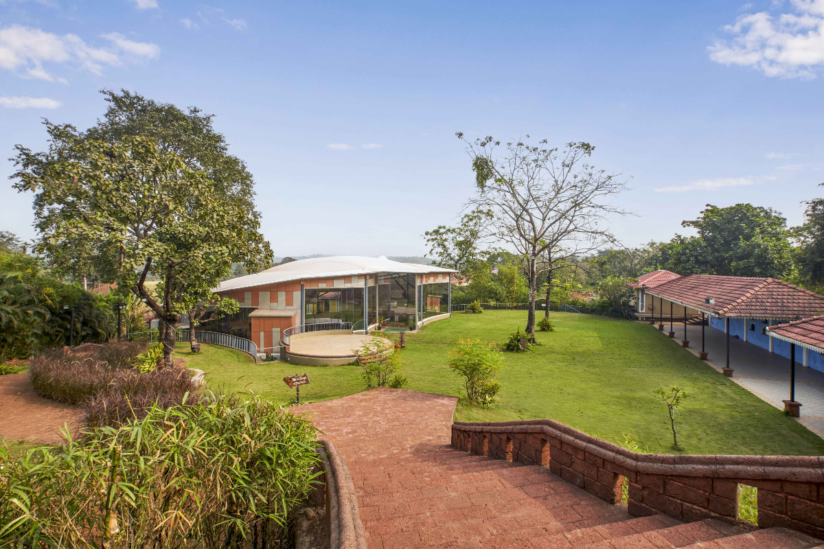 Momentz, Bicholim, North Goa, adaptable design, wedding venue, Sumedh Naik, Elements Design Studio, tensile fabric roofing, structural steel frame, multi-level venue, functionality, elegance, steel structure, prefabricated frames, topography, sustainability, recyclable materials, architectural innovation, aesthetic steel frame.

