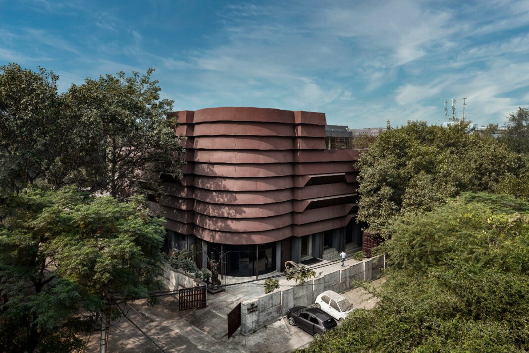 1_Rug Republic HQ_ A Sustainable, Minimalist Transformation in Delhi Rug Republic Headquarters, Okhla New Delhi, minimalist design, industrial transformation, sustainable architecture, corten steel facade, eco-friendly design, steel construction