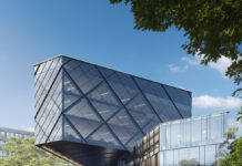 Cantilevered Diagrid: A Hybrid Steel and RCC Marvel in Kinshasa Steel-RCC hybrid system, Diagrid structure, Cantilevered high-rise, Structural engineering, Hybrid construction design, Kinshasa building project, Architectural engineering, Engineering innovation, High-rise architecture, Roark Consulting Engineers