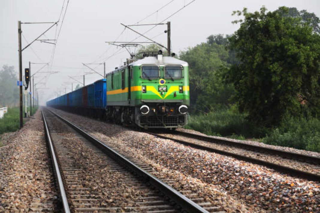 Freight train running on track. Southern India rail projects, regional economic growth, connectivity, logistics, industrial hubs, Indian Railways, infrastructural development, sustainable logistics, economic transformation