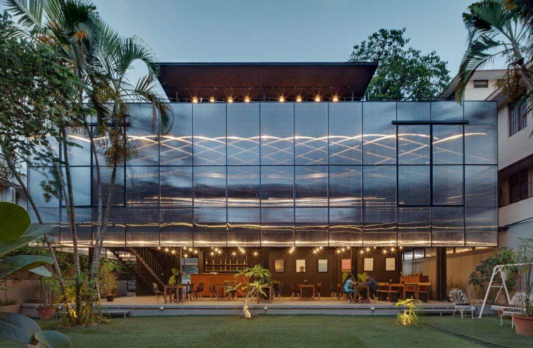 The Courtyard, Bengaluru, M9 Design Studio, steel, polycarbonate, sustainable architecture, prefabrication, light-box effect, modular design, urban landmark, event space, modern architecture, innovative design, industrial materials, natural light, steel structure, eco-friendly design.