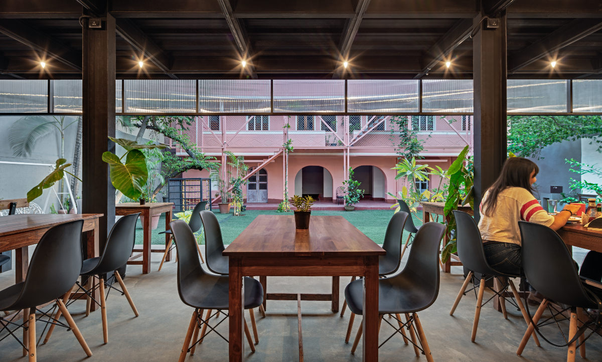 The Courtyard, Bengaluru, M9 Design Studio, steel, polycarbonate, sustainable architecture, prefabrication, light-box effect, modular design, urban landmark, event space, modern architecture, innovative design, industrial materials, natural light, steel structure, eco-friendly design.
