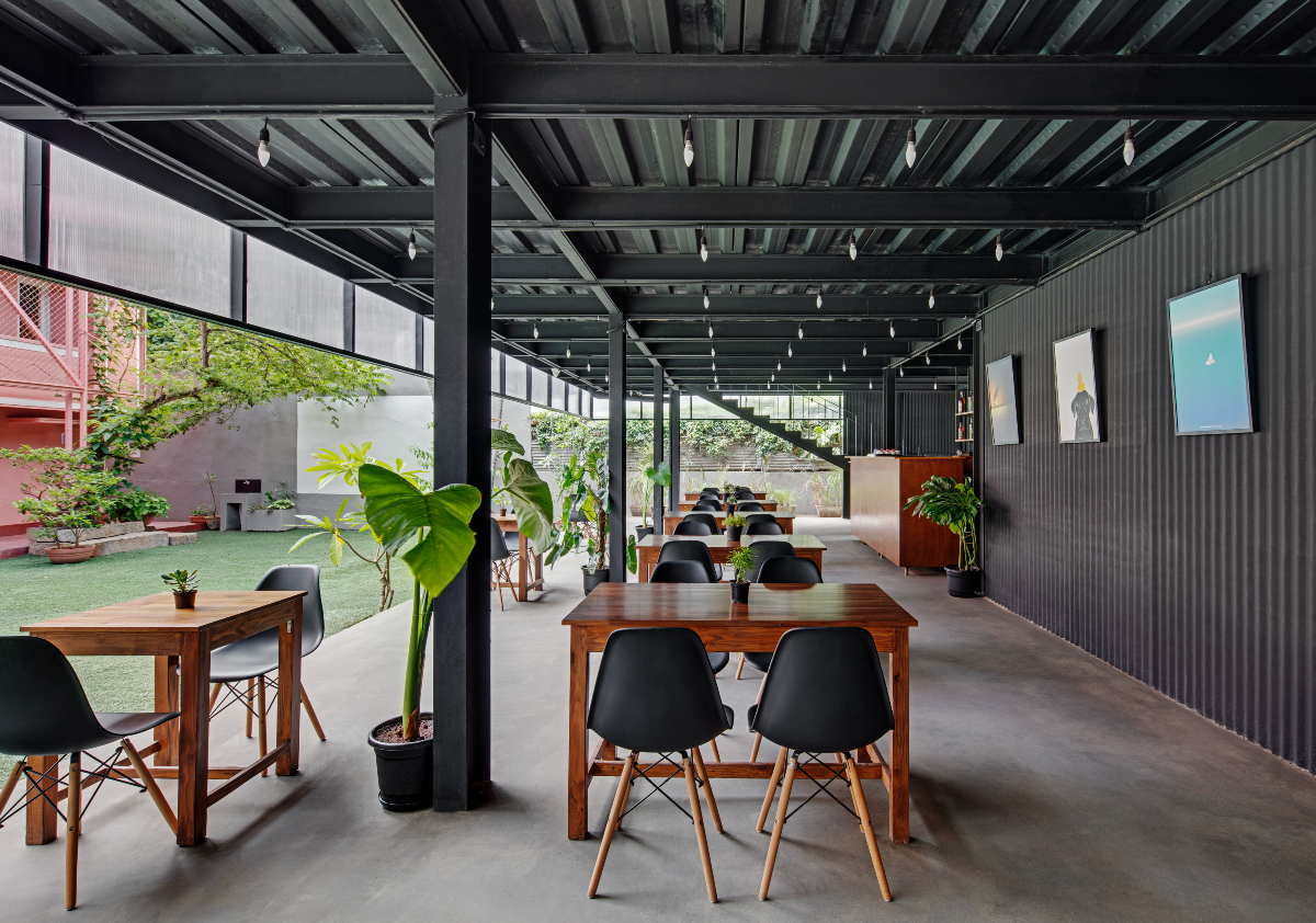 The Courtyard, Bengaluru, M9 Design Studio, steel, polycarbonate, sustainable architecture, prefabrication, light-box effect, modular design, urban landmark, event space, modern architecture, innovative design, industrial materials, natural light, steel structure, eco-friendly design.
