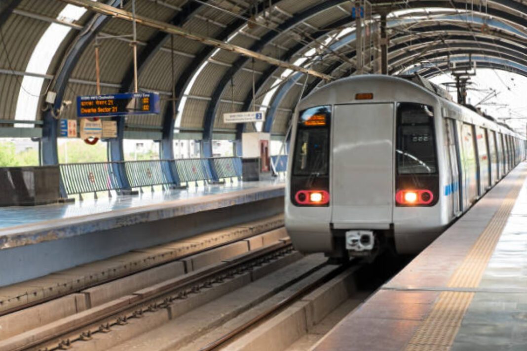 Metro arriving at Dwarka station in New Delhi India Asia Delhi Metro, Rithala-Narela-Kundli corridor, Red Line extension, NCR connectivity, Union Cabinet approval, DMRC, Phase IV projects, economic growth, metro stations