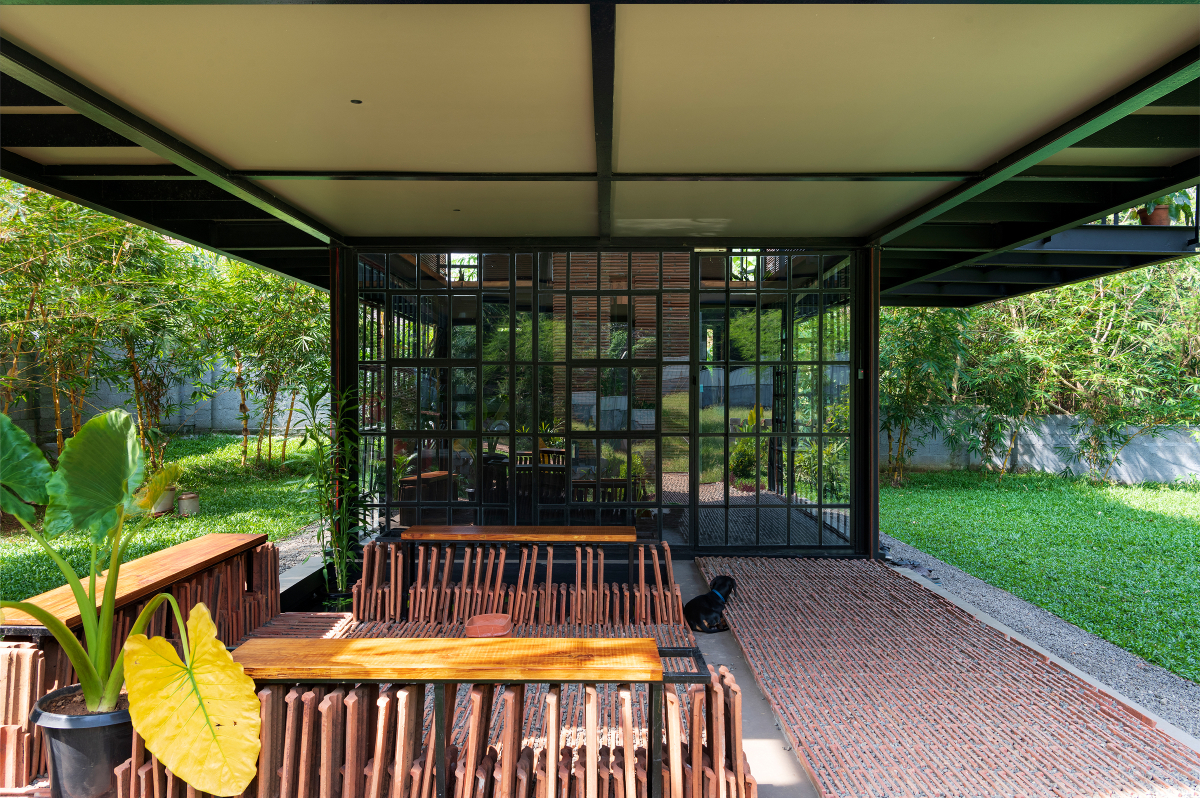 Koshish House, Kochi, sustainability, architectural design, material reuse, terracotta tiles, steel repurposing, creative design, elevated structure, dynamic spatial experience, natural light, local collaboration, eco-friendly construction, modern architecture