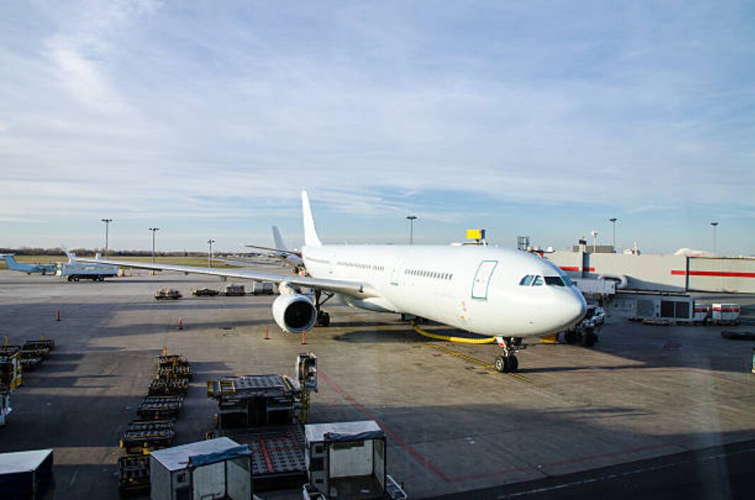 Airplane seen from interior of airport Nagpur Airport, MADC, MIL, GMR Group, airport expansion, infrastructure, land transfer, Maharashtra airports