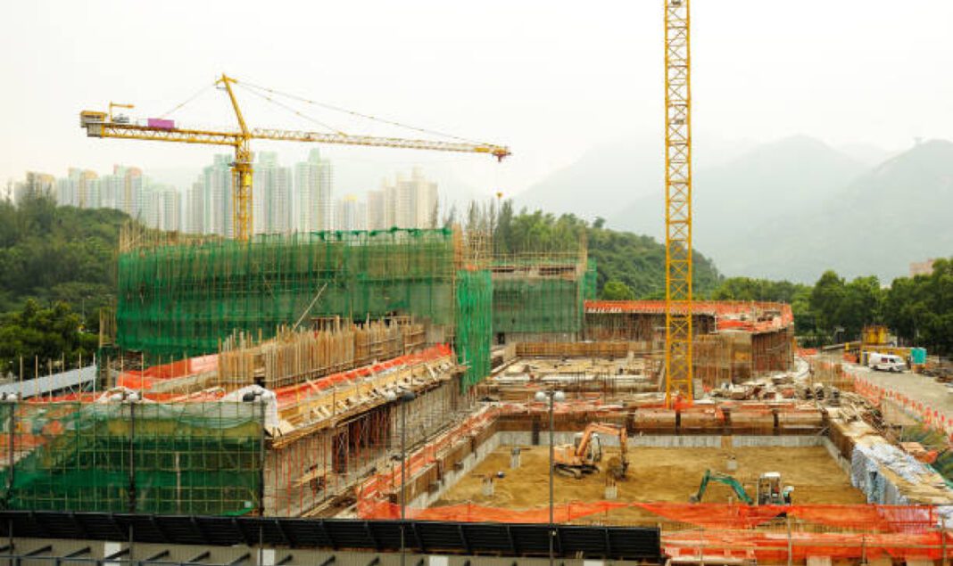 Adani Group, Assam investment, infrastructure, Advantage Assam Summit, airport development, power transmission, economic growth