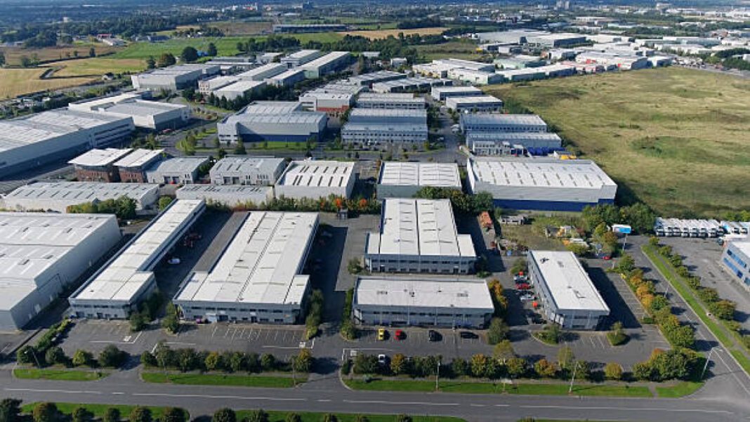 Industrial units from air Kerala industrial parks, Vizhinjam Port, Thiruvananthapuram development, logistics hub, SEZ, port-led industrialization, Kinfra