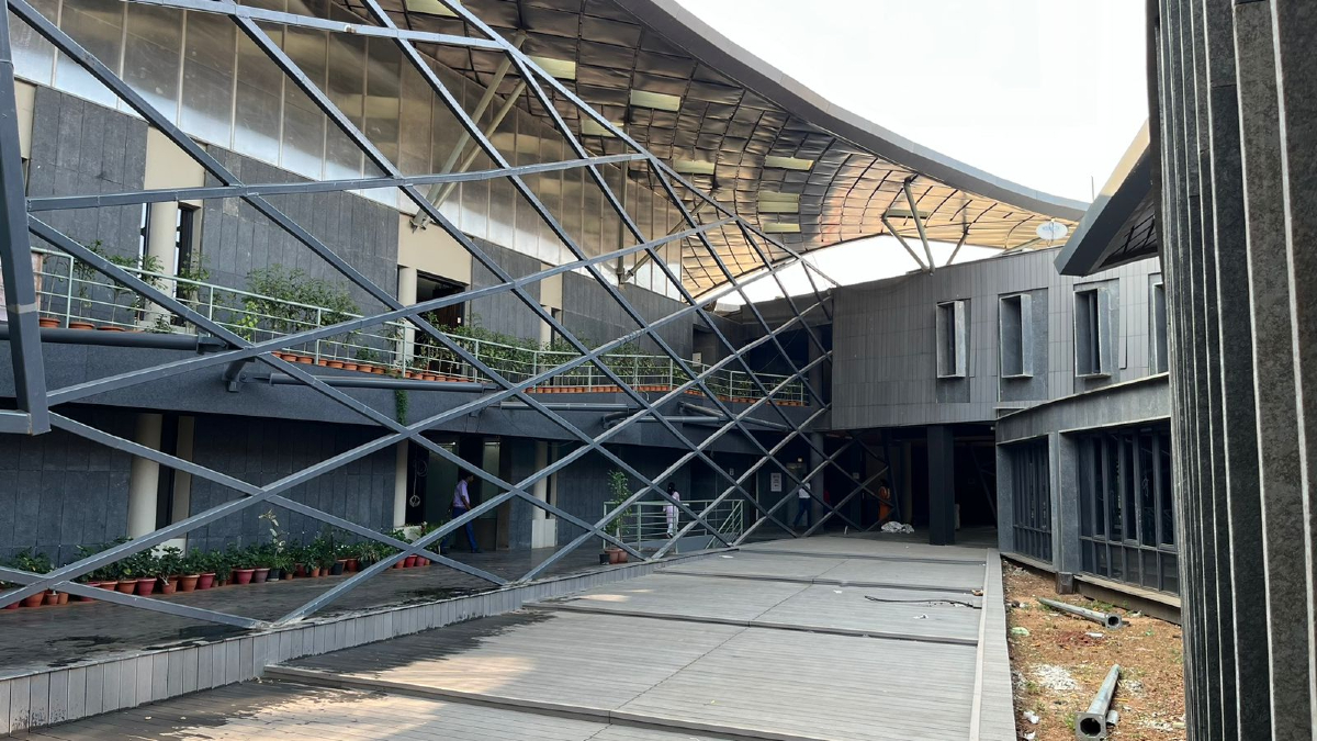 National Institute of Watersports (NIWS), Goa, Southeast Asia, water sports institute,double-curved steel roof, seismic-resistant design, lightweight structure, composite structure, aluminium sections, corten steel panels, perforated steel sunscreen, parametric grid roofs, grid shell structure, trapezoidal panels, structural innovation, fabrication challenges, engineering resilience, M:OFA Studios, DELF Consulting Engineers, Jade Consultants, Ramjidas Constructions