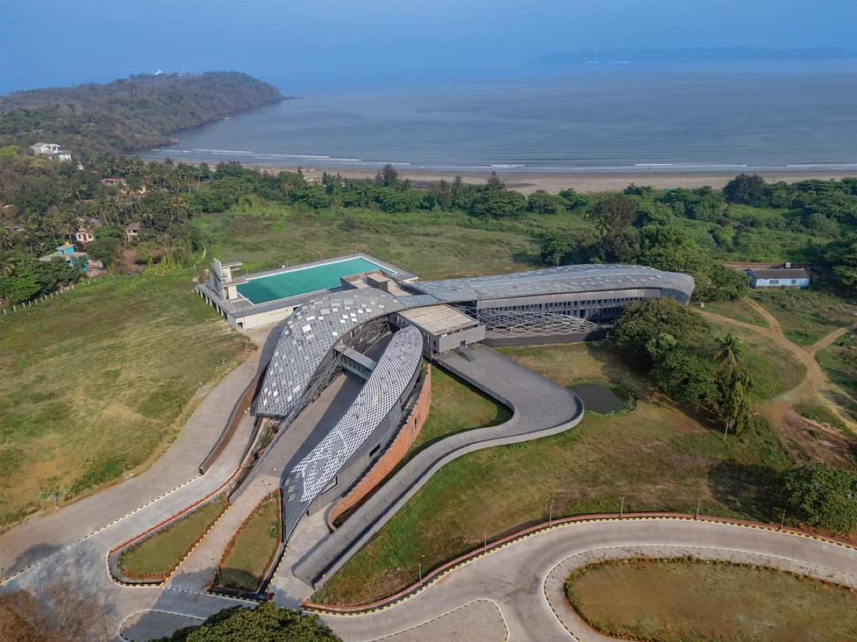 National Institute of Watersports (NIWS), Goa, Southeast Asia, water sports institute,double-curved steel roof, seismic-resistant design, lightweight structure, composite structure, aluminium sections, corten steel panels, perforated steel sunscreen, parametric grid roofs, grid shell structure, trapezoidal panels, structural innovation, fabrication challenges, engineering resilience, M:OFA Studios, DELF Consulting Engineers, Jade Consultants, Ramjidas Constructions