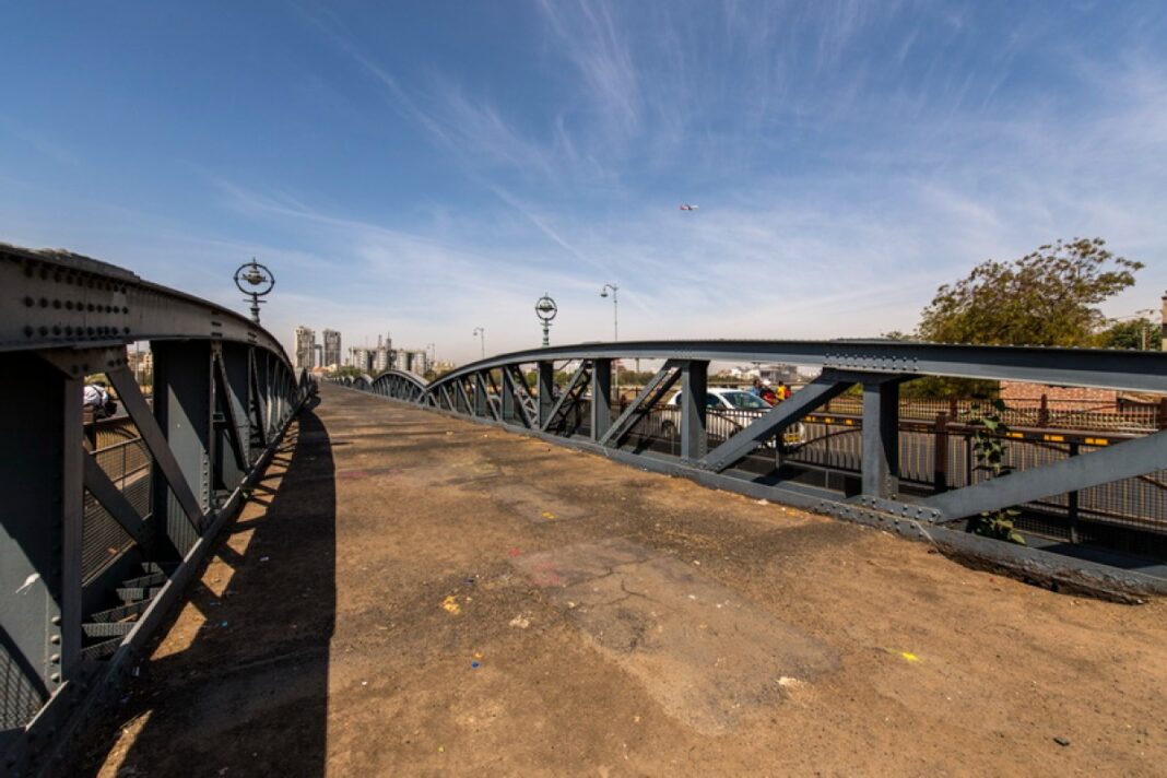 Bhupendra Patel, Ellis Bridge, Ahmedabad, heritage bridge, Swarnim Jayanti Chief Minister Urban Development Scheme, restoration, advanced repair technology, steel structure, truss repair, anti-corrosion treatment, structural integrity, bridge preservation,