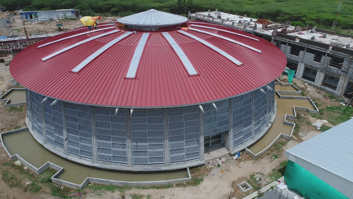 Nettur Technical Training Foundation, Tamil Nadu, cutting-edge architecture, glass and steel  sustainable design, steel strength, open web structure, perforated CRC steel sheets, semi-spherical roof, steel trusses, fabricated truss, architect Noel V Jerald, consultant Bal Kulkarni, Delcons Consultants, C-Tech Engineering