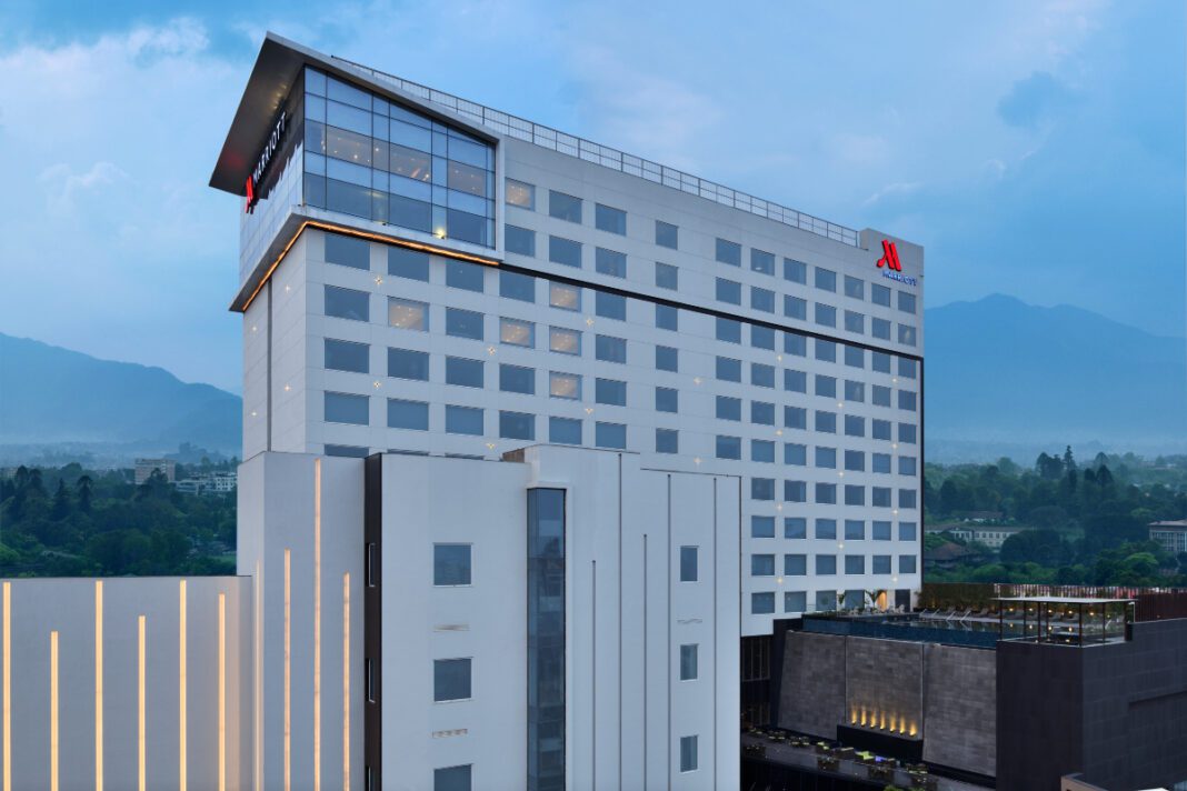 Marriott Hotel, Kathmandu, sustainable design, seismic resilience, steel construction, Nepalese heritage, earthquake-resistant architecture, LEED Gold, luxury hospitality, energy-efficient systems, solar energy, recycled steel, environmental sustainability, modern architecture, cultural integration.